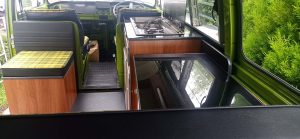 Camper units Cherry-finish with gloss black worktop